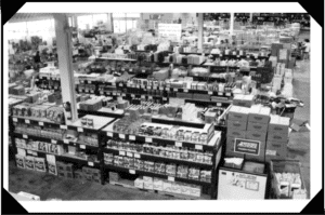 A black and white photo of a store floor.